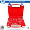 Dental Rubber Dam Endodontic Assorted Box Setup with clamps, frame, Ainsworth punch, and Brewer forceps.