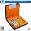 Dental Rubber Dam Endodontic Assorted Box Setup including clamps, frame, Ainsworth punch, and Brewer forceps.